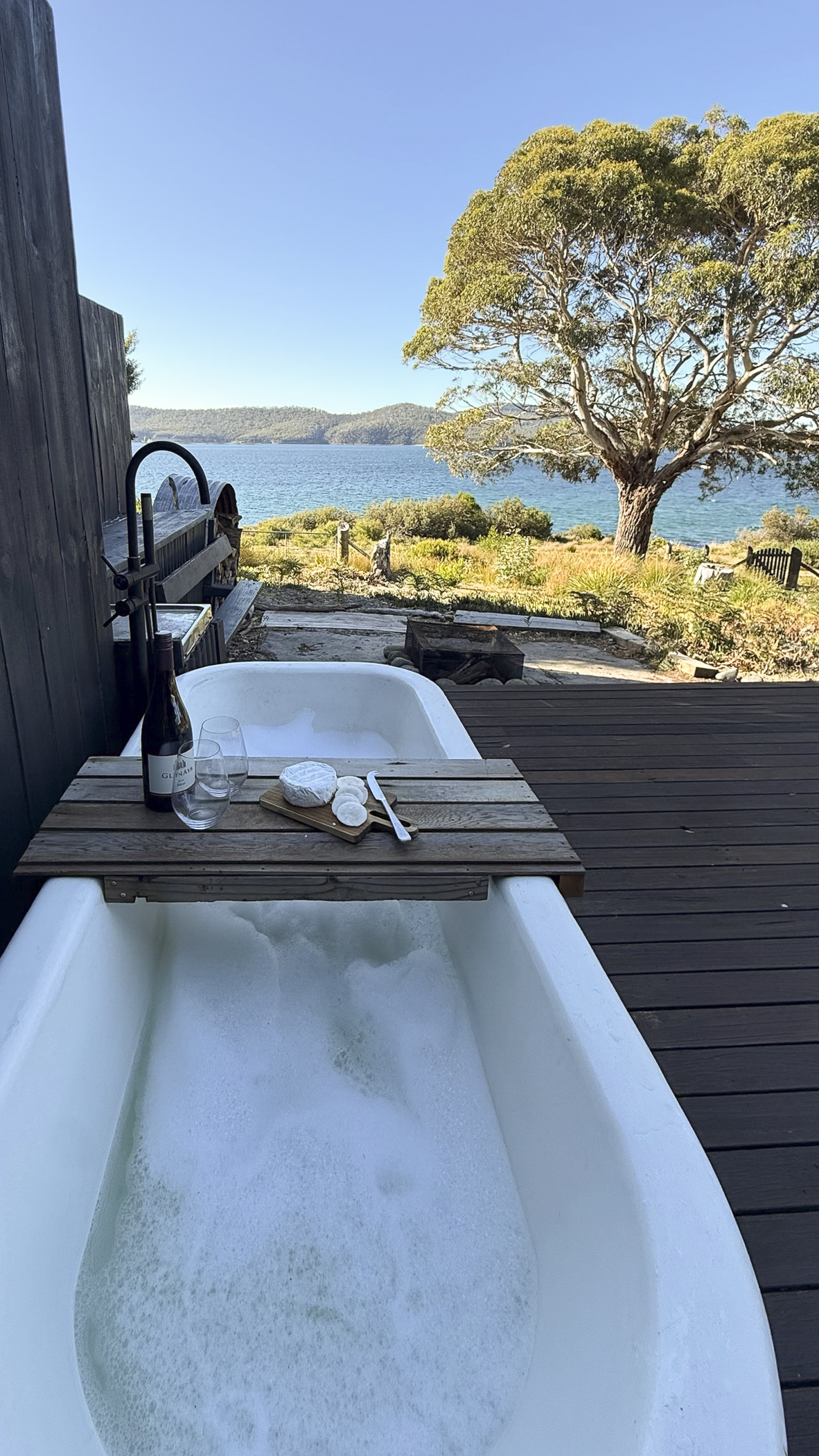 Outdoor bath overlooking the water